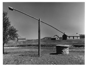 Image of Well with Sweep. Stone Houses & Corral/Background