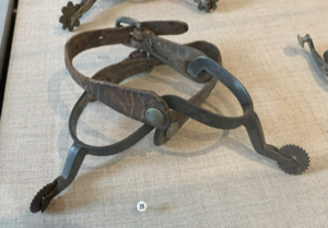 Image of Spurs (pair) worn by Watt at age 10