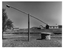 Image of Well with Sweep. Stone Houses & Corral/Background