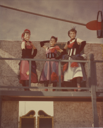 Image of Fandangle Costume - Musselman, Rose & Turner on Balcony of Saloon Set