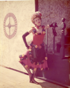 Image of Fandangle Costume - Margie Sedwick Bray with Arm on Bannister